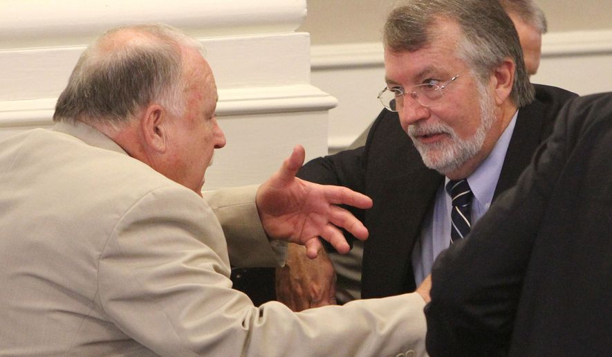 FILE In this June 27, 2012 file photo, then, Speaker of the House William O'Brien, right, talks with former Speaker Gene Chandler at the Statehouse. On Tuesday Nov. 18, 2014 O'Brien defeated Chandler during a Republican caucus to be the next speaker of the New Hampshire House. The full House will vote to confirm the nomination on Dec. 3.(AP Photo/Jim Cole/FILE)