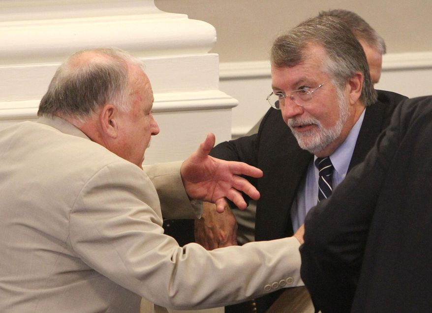 FILE In this June 27, 2012 file photo, then, Speaker of the House William O'Brien, right, talks with former Speaker Gene Chandler at the Statehouse. On Tuesday Nov. 18, 2014 O'Brien defeated Chandler during a Republican caucus to be the next speaker of the New Hampshire House. The full House will vote to confirm the nomination on Dec. 3.(AP Photo/Jim Cole/FILE)