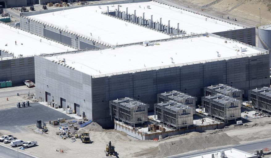 FILE - This June 6, 2013, file photo, shows the National Security Agency's Utah Data Center in Bluffdale, Utah. A Utah lawmaker is questioning whether city water should be shut off to a massive National Security Agency data-storage facility outside Salt Lake City. Republican Rep. Marc Roberts of Santaquin said he wants to explore whether the data center is getting any sweetheart deals on municipal water and power before a legislative committee hearing Wednesday afternoon. (AP Photo/Rick Bowmer, File)