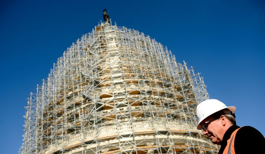 The Architect of the Capitol Stephen Ayers gives an update on the completion of the scaffolding and the start of repairs for the U.S. Capitol Dome Restoration Project at the roof of the U.S. Capitol Building, Washington, D.C., Tuesday, Nov. 18, 2014. (Andrew Harnik/The Washington Times)