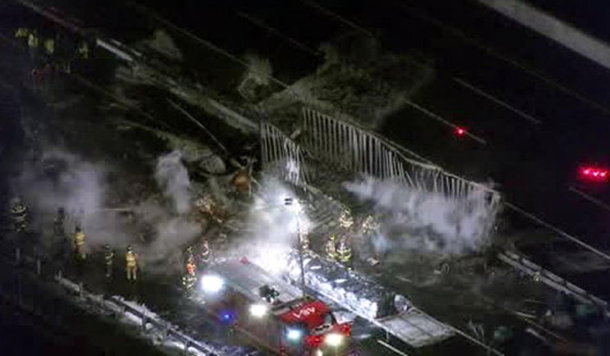 This image made from video provided by WPVI-TV/6abc shows a fiery tractor-trailer crash on the New Jersey Turnpike near Cranbury, N.J., on Tuesday, Nov. 18, 2014. State police say three tractor-trailers were involved in the fiery crash that forced the closure of all northbound lanes. (AP Photo/WPVI-TV/6abc)  MANDATORY CREDIT