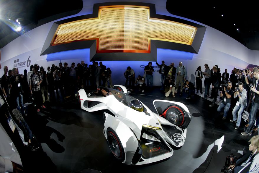 Chevrolet introduces the Chaparral 2X Vision Gran Turismo concept race car at the Los Angeles Auto Show on Wednesday, Nov. 19, 2014, in Los Angeles. The annual event is open to the public beginning Nov. 21. (AP Photo/Chris Carlson)
