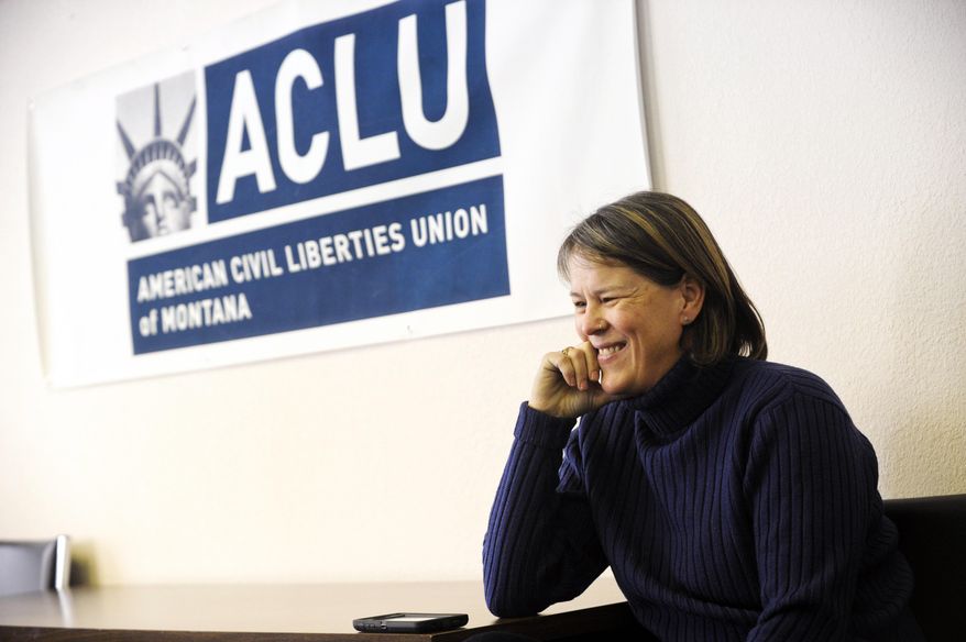 Sue Hawthorne smiles during a news conference announcing the ruling by U.S. District Court Judge Brian Morris calling Montana's gay marriage ban unconstitutional, Wednesday, Nov. 19, 2014 in Helena, Mont. Hawthorne and her partner Adel Johnson are plaintiffs in the case and were married earlier this year in Washington state. (AP Photo/The Independent Record, Thom Bridge)