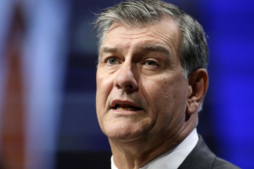 FILE - In this Friday, June 20, 2014 file photo, Dallas Mayor Mike Rawlings makes remarks during the opening of the 82nd annual meeting of the U.S. Conference of Mayors, in Dallas. Mayor Rawlings has announced a six-person expert panel to make recommendations about the proposed Trinity River toll road. Rawlings said the six urban planners and transportation experts will convene in Dallas next month to discuss the nine-mile road. (AP Photo/Tony Gutierrez, File)