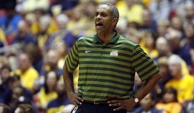 George Mason basketball coach Paul Hewitt yells out instructions to his players during the first half of an NCAA college basketball game against West Virgini in San Juan, Puerto Rico, Thursday, Nov. 20, 2014. (AP Photo/Ricardo Arduengo) **FILE**
