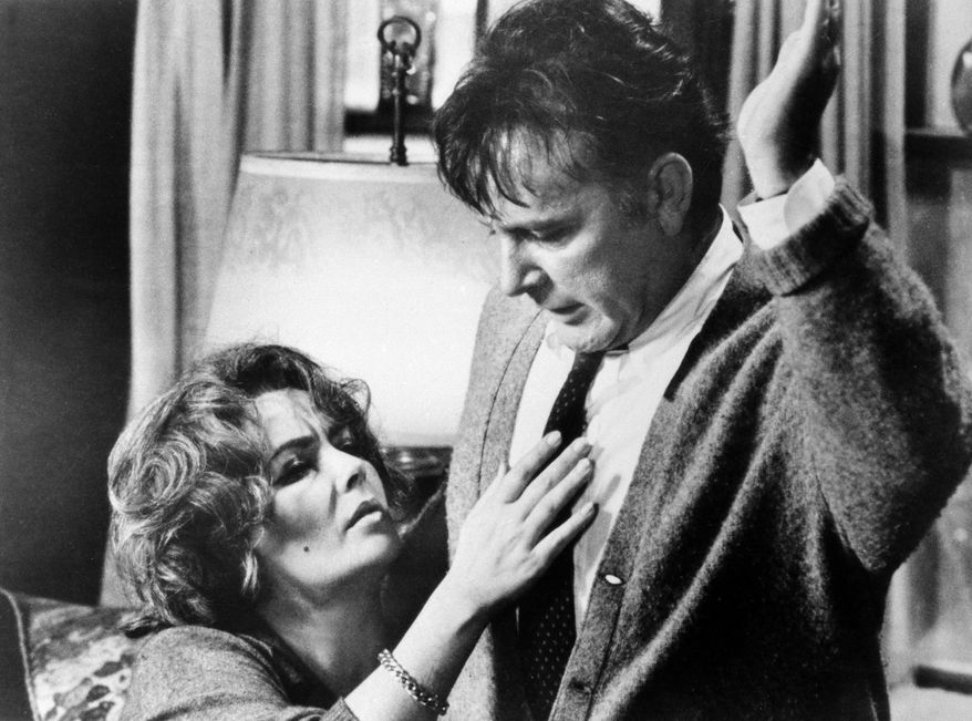 FILE - In this 1966 file photo originally released by Warner Bros., Elizabeth Taylor, left, and Richard Burton, are shown in a scene from the film, "Who's Afraid of Virginia Woolf." The film was directed by Mike Nichols, who died Wednesday, Nov. 20, 2014, at age 83. (AP Photo/Warner Bros., file)