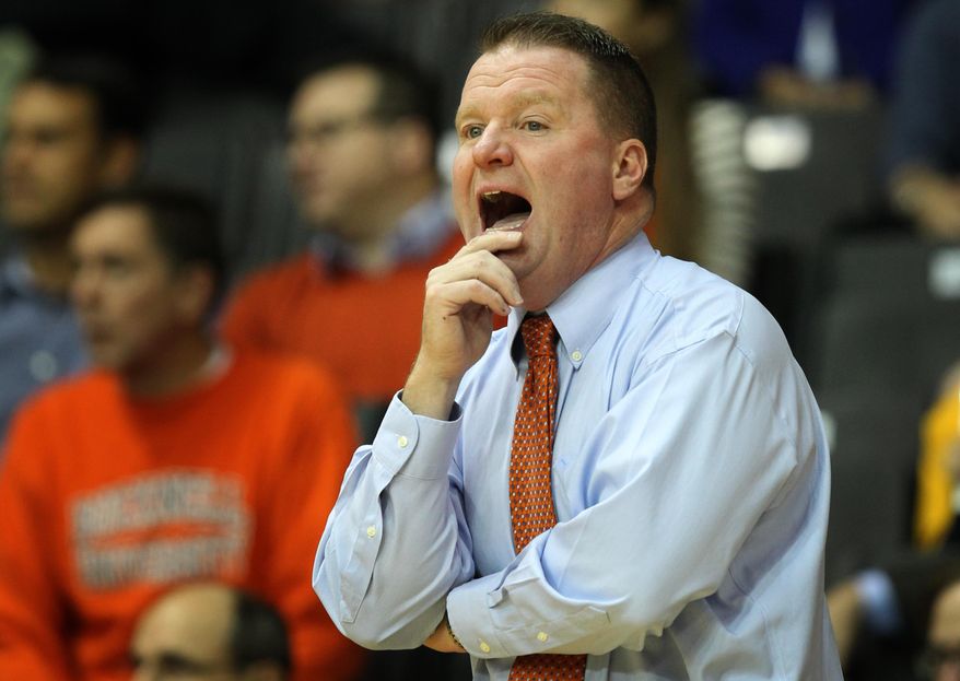 Bucknell coach Dave Paulson shouts from the bench in the first half of an NCAA college basketball game against Villanova, Thursday, Nov. 20, 2014, in Villanova, Pa. Villanova won 72-65. (AP Photo/Laurence Kesterson)