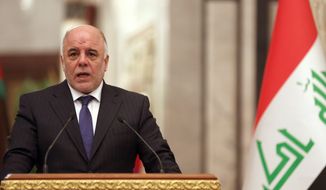 Iraqi prime Minister Haider al-Abadi, speaks at a press conference with Turkey&#39;s  Prime Minister Ahmet Davutoglu in Baghdad, Iraq, Thursday, Nov. 20, 2014. Iraq&amp;#8217;s prime minister said on Thursday that his country and neighboring Turkey have agreed on closer security and intelligence cooperation in the face of the threat posed by the Islamic State group. (AP Photo/Hadi Mizban, Pool)