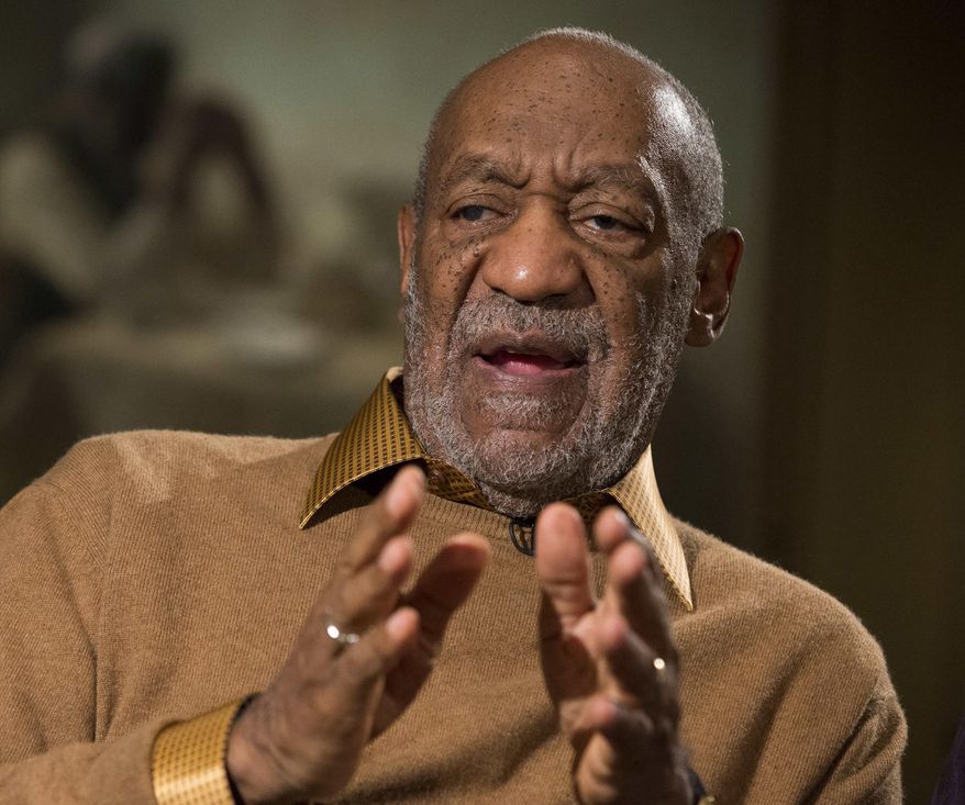 FILE - In this Nov. 6, 2014 file photo, entertainer Bill Cosby gestures during an interview about the upcoming exhibit, "Conversations: African and African-American Artworks in Dialogue, " at the Smithsonian's National Museum of African Art, in Washington. After amassing a private collection of African-American Art over four decades, Bill Cosby and his wife Camille plan to showcase their holdings for the first time in an exhibition planned at the Smithsonian Institution. Temple University says Bill Cosby remains a trustee of the Philadelphia institution despite renewed scrutiny of sexual assault allegations in recent weeks. Through his lawyer, the 77-year-old comedian has strongly denied wrongdoing. Cosby has never been charged. (AP Photo/Evan Vucci, File)