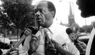 Mayor Marion Barry arrives at a meeting of the Financial Control Board at the headquarters on Thomas Circle in Northwest on June 10, 1996. (Kevin T. Gilbert/The Washington Times)