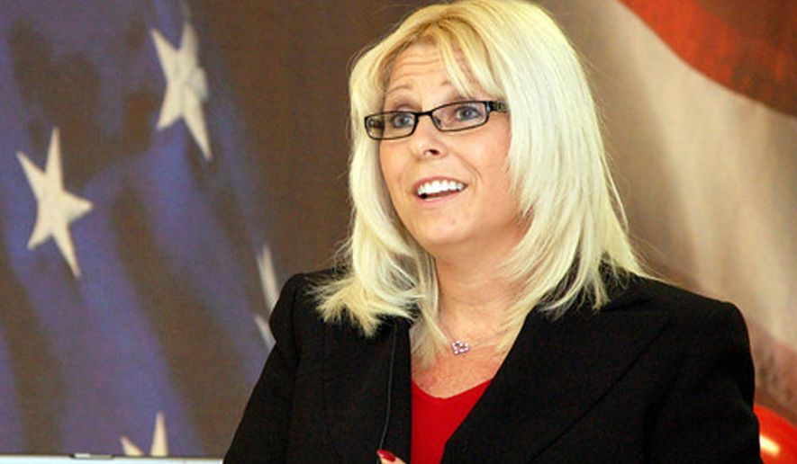 This undated handout photo provided by The Veterans Affairs Department, shows Sharon Helman, director of the Phoenix VA Health Care System.   Helman was fired Monday, nearly seven months after she and two high-ranking officials were placed on administrative leave amid allegations that 40 veterans died while awaiting treatment at the hospital. Helman had led the Phoenix facility since February 2012.  Best quality available.   (AP Photo/Veterans Affairs Department)