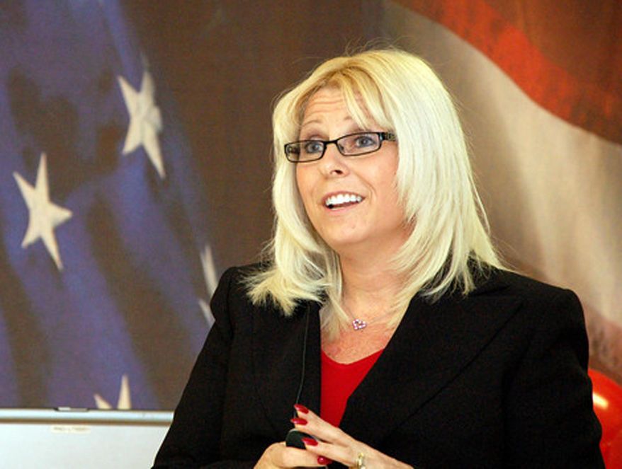 This undated handout photo provided by The Veterans Affairs Department, shows Sharon Helman, director of the Phoenix VA Health Care System.   Helman was fired Monday, nearly seven months after she and two high-ranking officials were placed on administrative leave amid allegations that 40 veterans died while awaiting treatment at the hospital. Helman had led the Phoenix facility since February 2012.  Best quality available.   (AP Photo/Veterans Affairs Department)