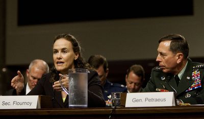 U.S. Central Commander Gen. David Petraeus looks on at right as Defense Undersecretary Michele Flournoy testifies on Capitol Hill in Washington, Wednesday, June 16, 2010, before the Senate Armed Services Committee hearing on Afghanistan. (AP Photo/Drew Angerer)