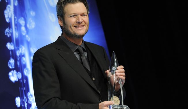 Blake Shelton&#x27;s new holiday album features contributions from his wife, Miranda Lambert, as well Reba McEntire and even his mom, Dorothy Shackleford. (Photo by Evan Agostini/Invision/AP)