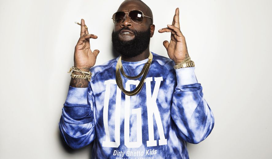 This Nov. 11, 2014 photo shows rapper Rick Ross posing for a portrait at Def Jam In New York in promotion of his album "Hood Billionaire," released on Monday, Nov. 24. (Photo by Victoria Will/Invision/AP, File)