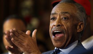 Rev. Al Sharpton speaks during a news conference Tuesday, Nov. 25, 2014, in St. Louis County, Mo.  Rioting broke out Monday after a grand jury decided not to indict a white Ferguson police officer in the shooting death of the unarmed, black 18-year-old Michael Brown. (AP Photo/Jeff Roberson)