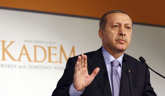 Turkish President Recep Tayyip Erdogan addresses women in Istanbul, Turkey in this Monday, Nov. 24, 2014, photo. (AP Photo) ** FILE **