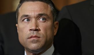 FILE - This May, 29, 2014, file photo shows Rep. Michael Grimm, R-N.Y., at an event calling for reforms in the scandal plagued Veterans Administration, on Capitol Hill in Washington. Grimm won re-election this month, but he still faces a criminal investigation into possible campaign finance violations, as well as a 20-count indictment on tax fraud and other charges. (AP Photo/J. Scott Applewhite, File)