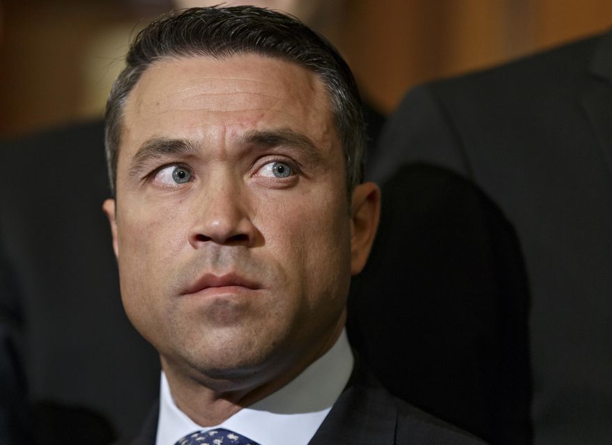 FILE - This May, 29, 2014, file photo shows Rep. Michael Grimm, R-N.Y., at an event calling for reforms in the scandal plagued Veterans Administration, on Capitol Hill in Washington. Grimm won re-election this month, but he still faces a criminal investigation into possible campaign finance violations, as well as a 20-count indictment on tax fraud and other charges. (AP Photo/J. Scott Applewhite, File)
