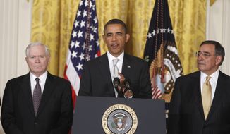 This April 28, 2011, file photo shows President Barack Obama with then-outgoing Defense Secretary Robert Gates, left, and then-Defense Secretary-nominee Leon Panetta, in the East Room of the White House in Washington. (AP Photo/Charles Dharapak, File)