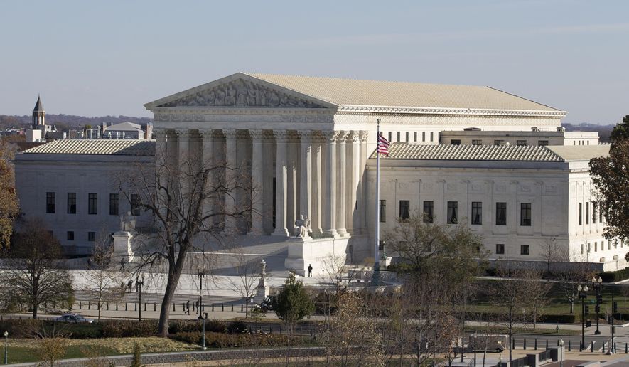 This Nov. 18, 2014, file photo shows the U.S. Supreme Court in Washington, as seen from the roof of the U.S. Capitol. Anthony Elonis claimed he was just kidding when he posted a series of graphically violent rap lyrics on Facebook about killing his estranged wife, shooting up a kindergarten class and attacking an FBI agent. But his wife didn&#x27;t see it that way. Neither did a federal jury. (AP Photo/Carolyn Kaster, File)