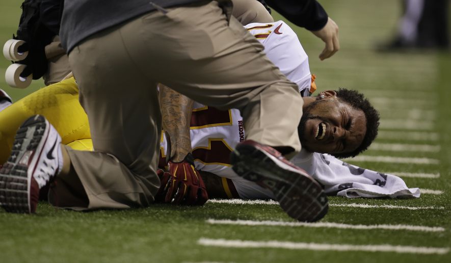 Washington Redskins wide receiver DeSean Jackson is injured during the second half of an NFL football game against the Indianapolis Colts Sunday, Nov. 30, 2014, in Indianapolis. (AP Photo/AJ Mast)