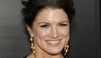 Actress Gina Carano arrives at the premiere of the feature film &quot;Haywire&quot; in Los Angeles on Thursday, Jan. 5, 2012. (AP Photo/Dan Steinberg)  ** FILE **