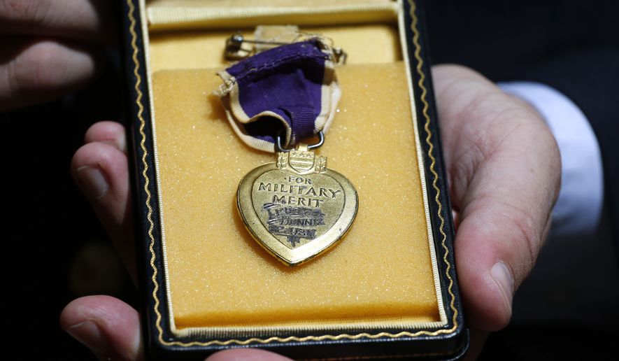 Victims of the Fort Hood shooting will soon be eligible to receive the Purple Heart, with Congress pushing ahead with a policy change that would officially recognize domestic terrorism as an issue, rather than the &quot;workplace violence&quot; designation the Obama administration had used. (Associated Press) **FILE**