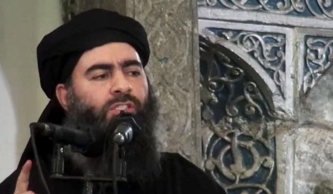 This file image made from video posted on a militant website Saturday, July 5, 2014, which has been authenticated based on its contents and other AP reporting, purports to show the leader of the Islamic State group, Abu Bakr al-Baghdadi, delivering a sermon at a mosque in Iraq. (AP Photo/Militant video, File)