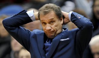 Minnesota Timberwolves head coach Flip Saunders watches during the second quarter of an NBA basketball game against the Philadelphia 76ers Wednesday, Dec. 3, 2014, in Minneapolis. (AP Photo/Hannah Foslien)