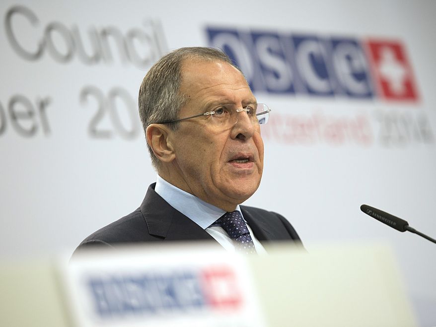 Russia's foreign minister Sergey Lavrov, speaks during a news conference at the Organization for Security and Cooperation in Europe (OSCE) ministerial meeting in the Exhibition Center in Basel, Switzerland, on Friday, Dec. 5 2014. (AP Photo/Keystone,Georgios Kefalas)