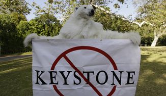 A member of the Center for Biological Diversity in polar bear costume protests the Keystone XL pipeline on May 7, 2014, during a visit by President Barack Obama for a two-day visit to Los Angeles for two political fundraisers. The Keystone XL pipeline would cross Montana, South Dakota and Nebraska, where it would connect with existing pipelines to reach refineries on the Texas Gulf Coast. The Obama administration announced last month it was delaying a decision on the pipeline&#x27;s fate indefinitely. (Associated Press) **FILE**