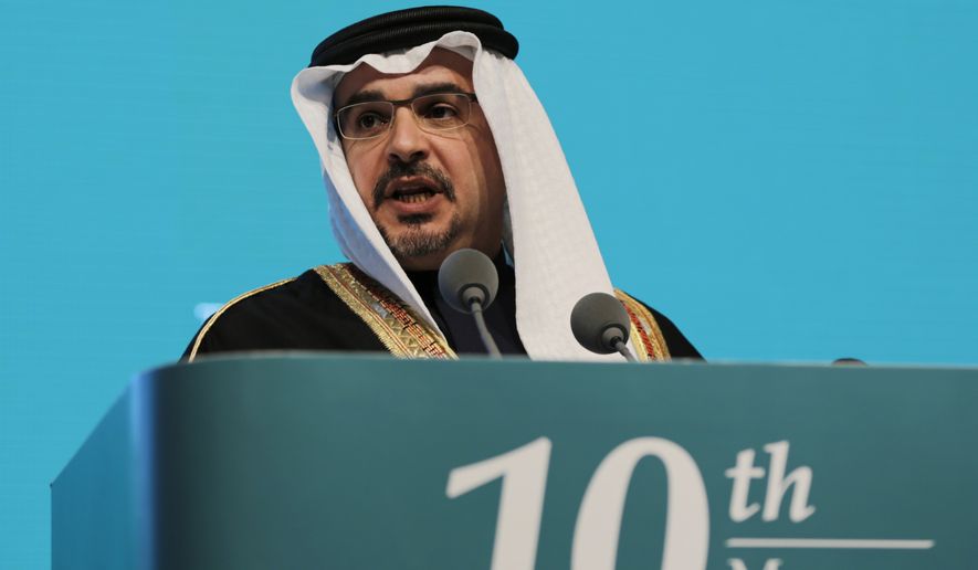 Bahraini Crown Prince Salman bin Hamad Al Khalifa addresses delegates at the opening session of the 10th Regional Security Summit held by the  International Institute for Strategic Studies, in Manama, Bahrain, Friday, Dec. 5, 2014. Senior ministers from Britain, France, Egypt, Iraq and the United Arab Emirates are among the participants, who are expected to discuss regional security and countering extremism, including efforts to fight the Islamic State group. (AP Photo/Hasan Jamali)