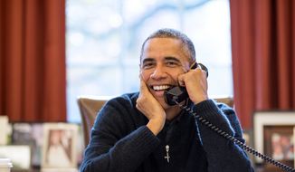 President Obama speaks on the phone in the Oval Office in this undated photo. (Official White House Photo by Pete Souza)