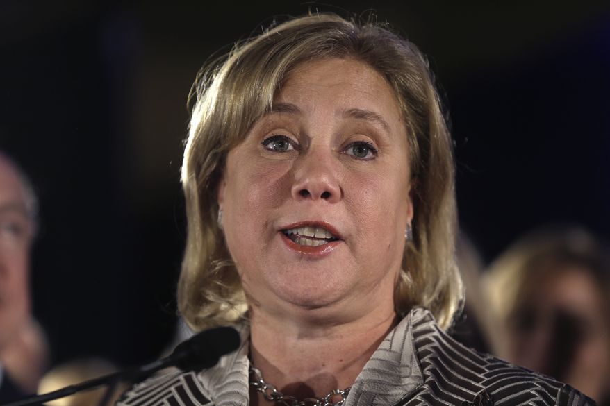 Sen. Mary Landrieu of Louisiana speaks to supporters as she concedes defeat in her runoff election against Rep. Bill Cassidy, a Republican on Saturday, Dec. 6, 2014. (AP Photo/Gerald Herbert)