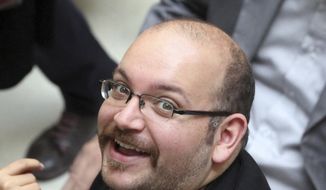 Jason Rezaian, an Iranian-American correspondent for The Washington Post, has been detained and unspecified charges have been leveled against him by Iran.  (AP Photo/Vahid Salemi, File)