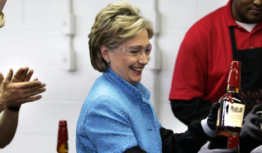 Democratic presidential hopeful Sen. Hillary Rodham Clinton, D-N.Y., reacts after dipping a bottle of whiskey into red wax at Maker&#39;s Mark Distillery in Loretto, Ky. Saturday, May 17, 2008. (AP Photo/Elise Amendola) **FILE**