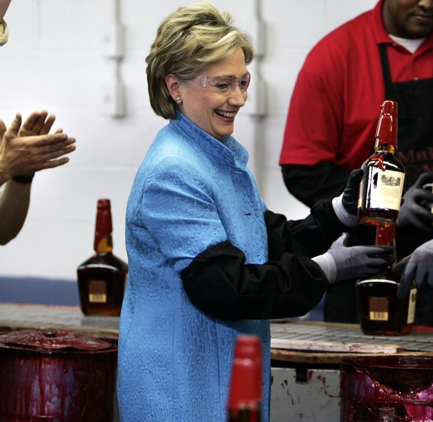 Democratic presidential hopeful Sen. Hillary Rodham Clinton, D-N.Y., reacts after dipping a bottle of whiskey into red wax at Maker&#39;s Mark Distillery in Loretto, Ky. Saturday, May 17, 2008. (AP Photo/Elise Amendola) **FILE**