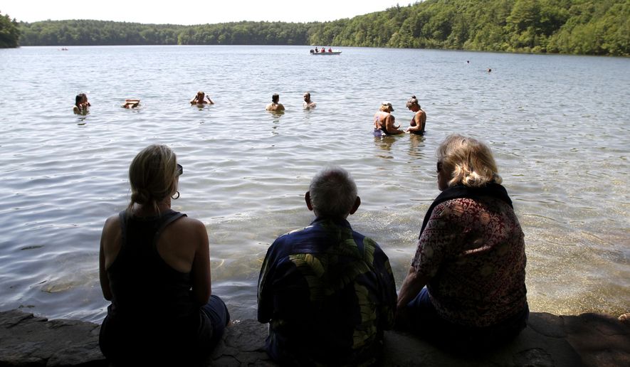 The simple, serene place that inspired Henry David Thoreau's work the most is going solar. (AP Photo/Steven Senne, File)