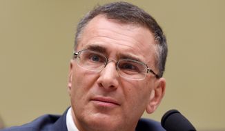 MIT economist Jonathan Gruber listens as he testifies on Capitol Hill in Washington, Tuesday, Dec. 9, 2014, before the House Oversight Committee health care hearing. Congressional Democrats charged Tuesday that Republicans are seizing on a health adviser&#39;s self-described &amp;quot;thoughtless&amp;quot; and misleading remarks to attack President Barack Obama&#39;s signature health care law.  (AP Photo/Molly Riley)