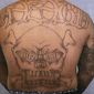 This undated photo provided by the U.S. Department of Justice shows a tattoo on a member of the Big Hazard gang on the east side of Los Angeles.  (AP Photo/U.S. Department of Justice) **FILE**