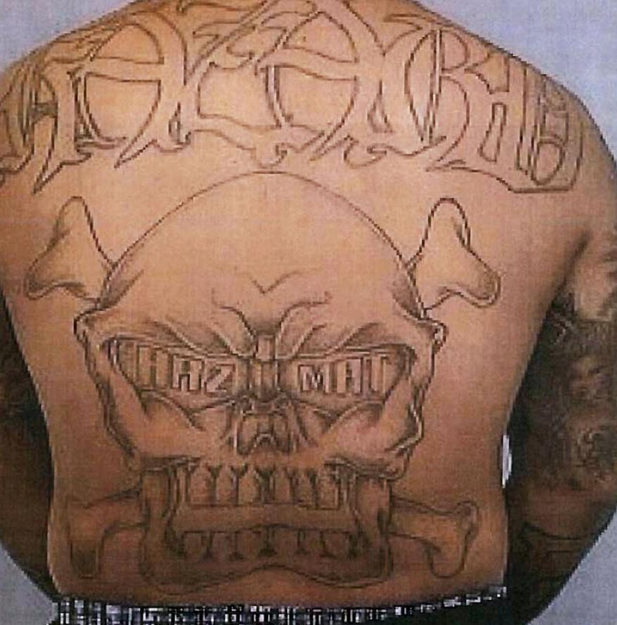 This undated photo provided by the U.S. Department of Justice shows a tattoo on a member of the Big Hazard gang on the east side of Los Angeles.  (AP Photo/U.S. Department of Justice) **FILE**