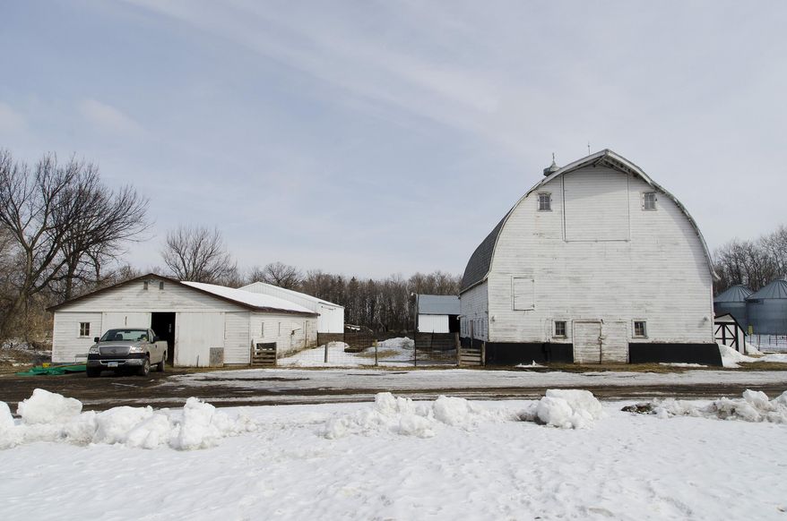 This April, 2014 photo shows snow covering the ground at a family farm located near Erskine, Minn. The new Republican majority in the Minnesota House has created several committees to address the concerns of rural lawmakers. Republicans plan to continue focusing more attention on Greater Minnesota rather than the Twin Cities, a theme that helped them reclaim the House, Minnesota Public Radio News reported. (AP Photo/Minnesota Public Radio, Nathaniel Minor)