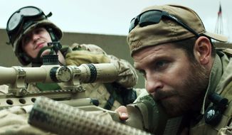 In this image released by Warner Bros. Pictures, Kyle Gallner, left, and Bradley Cooper appear in a scene from &amp;quot;American Sniper.&amp;quot;  The film, directed by Clint Eastwood, did not receive any Golden Globe nominations on Thursday.  (AP Photo/Warner Bros. Pictures)