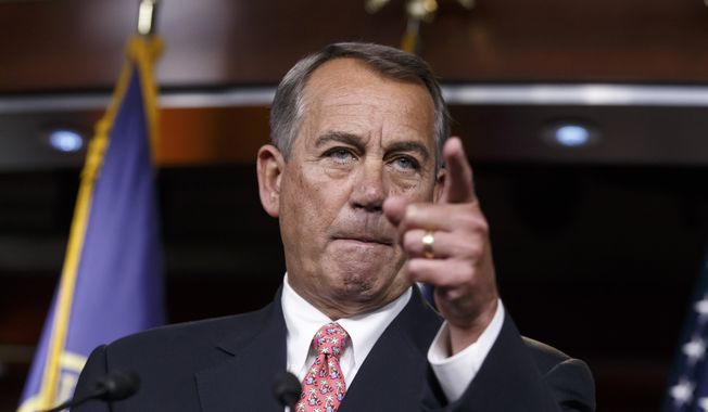 House Speaker John Boehner of Ohio holds what may be his last news conference of the 113th Congress Thursday, Dec. 11, 2014, on Capitol Hill in Washington. (AP Photo/J. Scott Applewhite)