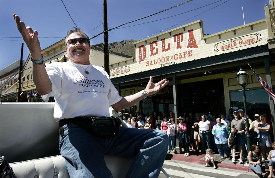 FILE - In this Monday, Sept. 5, 2005 file photo, former TV star, Max Baer Jr., waves to parade goers during the Labor Day parade in Virginia City, Nev. The actor who played Jethro Bodine in the 1960s television series “The Beverly Hillbillies” is suing CBS, arguing the broadcaster made inappropriate deals with an Iowa restaurant chain to use the character’s name. Max Baer Jr. filed a lawsuit Tuesday arguing that he had reached a deal with CBS giving him rights to use the TV character to establish a chain of restaurants, hotels and casinos. (AP Photo/Nevada Appeal, Chad Lundquist, File)