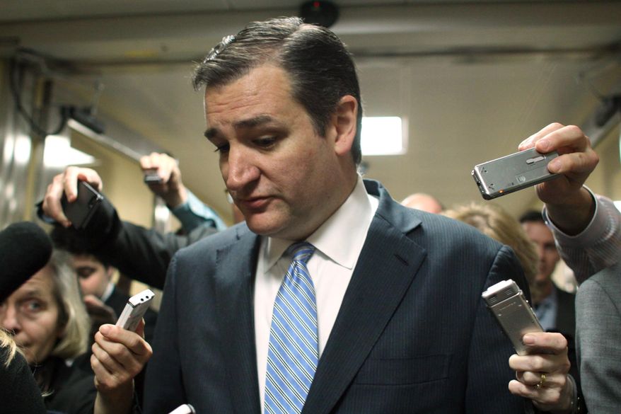 Sen. Ted Cruz, R-Texas talks with reporters on Capitol Hill in Washington, Friday, Dec. 12, 2014. (Associated Press) ** FILE **