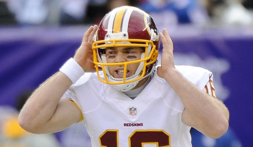 Washington Redskins quarterback Colt McCoy (16) calls an audible at the line of scrimmage during the first quarter of an NFL football game against the New York Giants, Sunday, Dec. 14, 2014, in East Rutherford, N.J. (AP Photo/Bill Kostroun) 