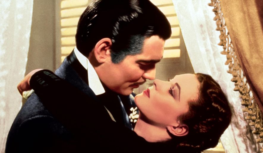 Clark Gable, left, appears in character as Rhett Butler and Vivien Leigh as Scarlett O&#x27;Hara, in the film &quot;Gone with the Wind.&quot; (AP Photo/Turner Classic Movies) ** FILE **