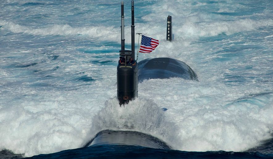 The Los Angeles-class attack submarine USS Tuscon (SSN 770) transits the East Sea while leading a 13-ship formation. (U.S. Navy photo by Mass Communication Specialist 3rd Class Adam K. Thomas/Released)